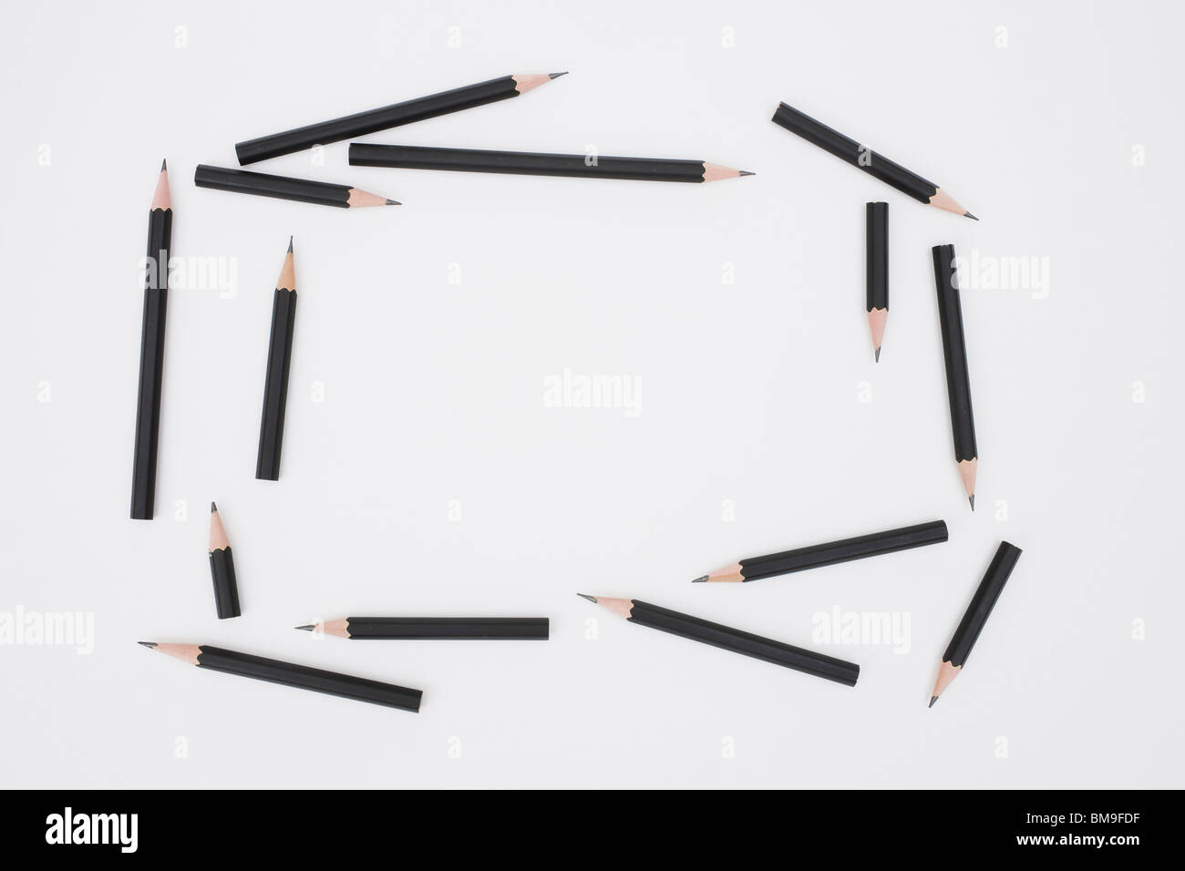 Pencils making frame on white background Stock Photo
