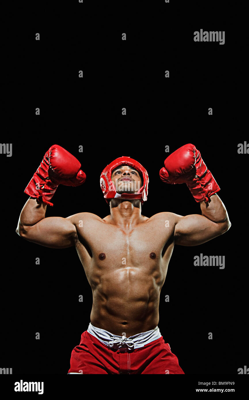 Male boxer with arms over his head Stock Photo Alamy