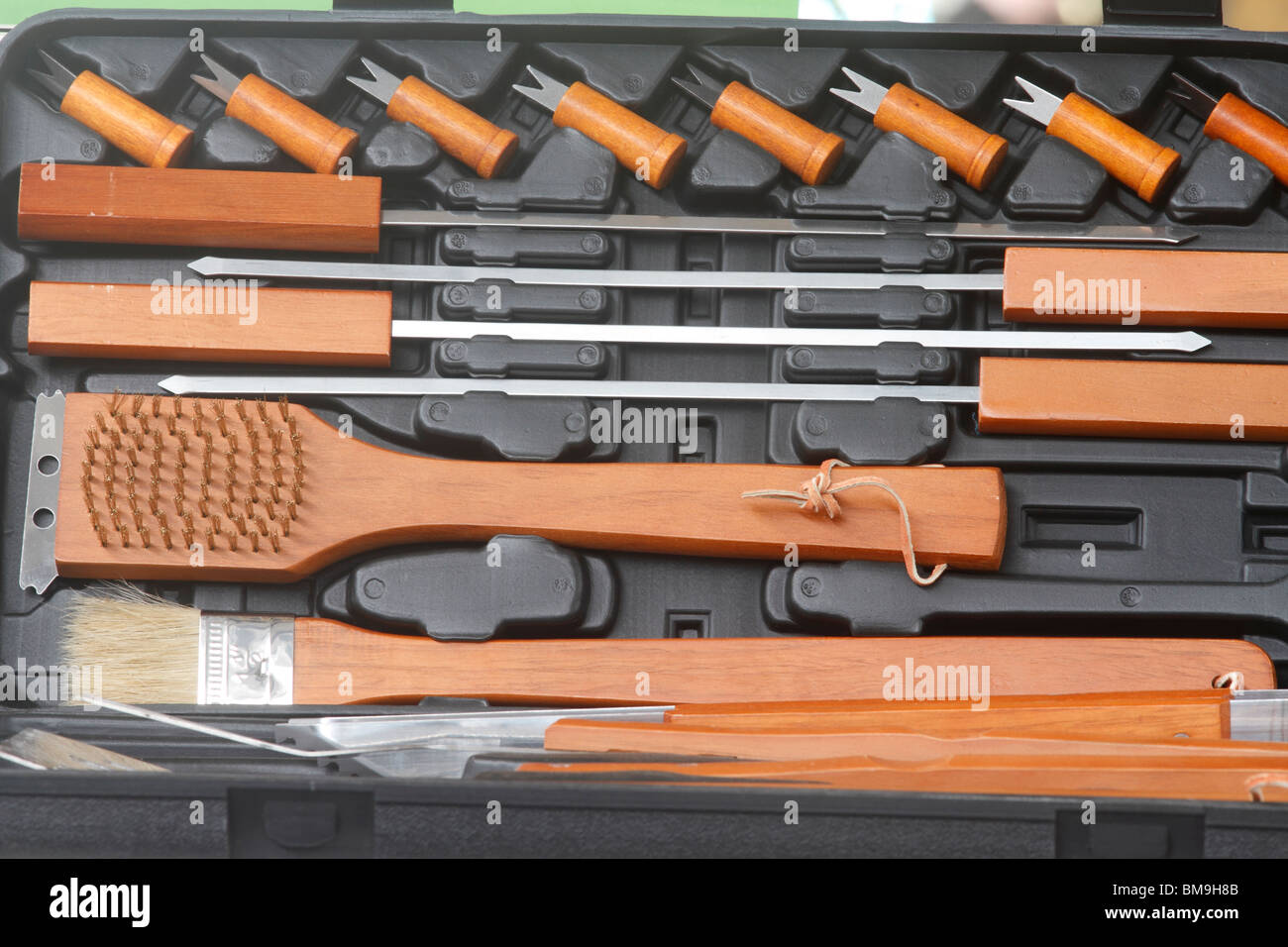 Bar-B-Q tools in a case. Wire brush, spikes, skewers, brushes Brookfields garden Centre, Nottingham Stock Photo