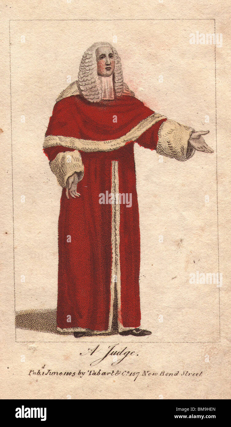 A Judge in long white wig and red velvet robes, bordered with white fur. Stock Photo