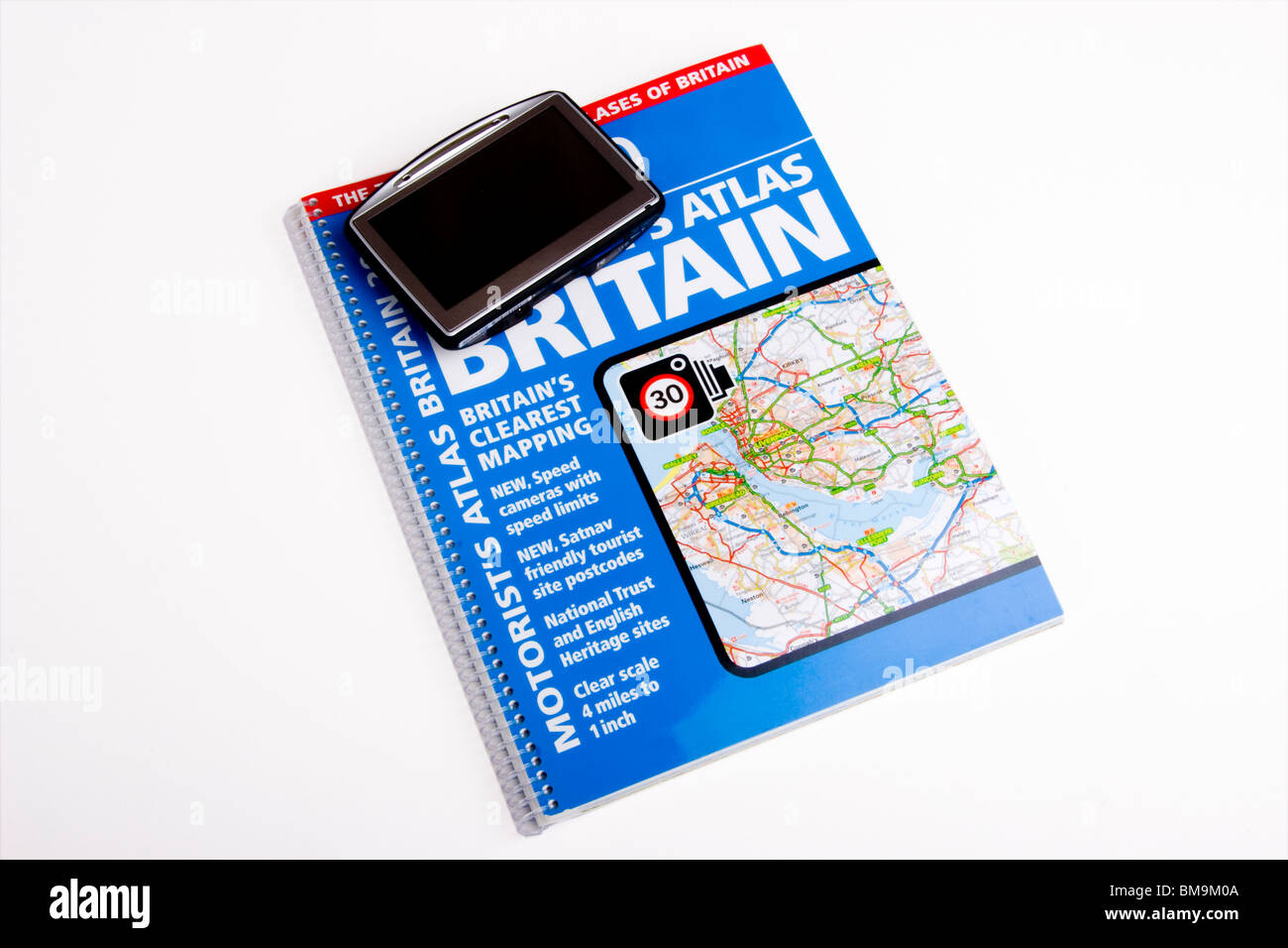 Atlas book with satellite navigation device Stock Photo Alamy