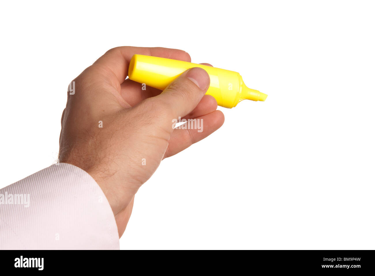 man holding a yellow marker pen in his hand Stock Photo