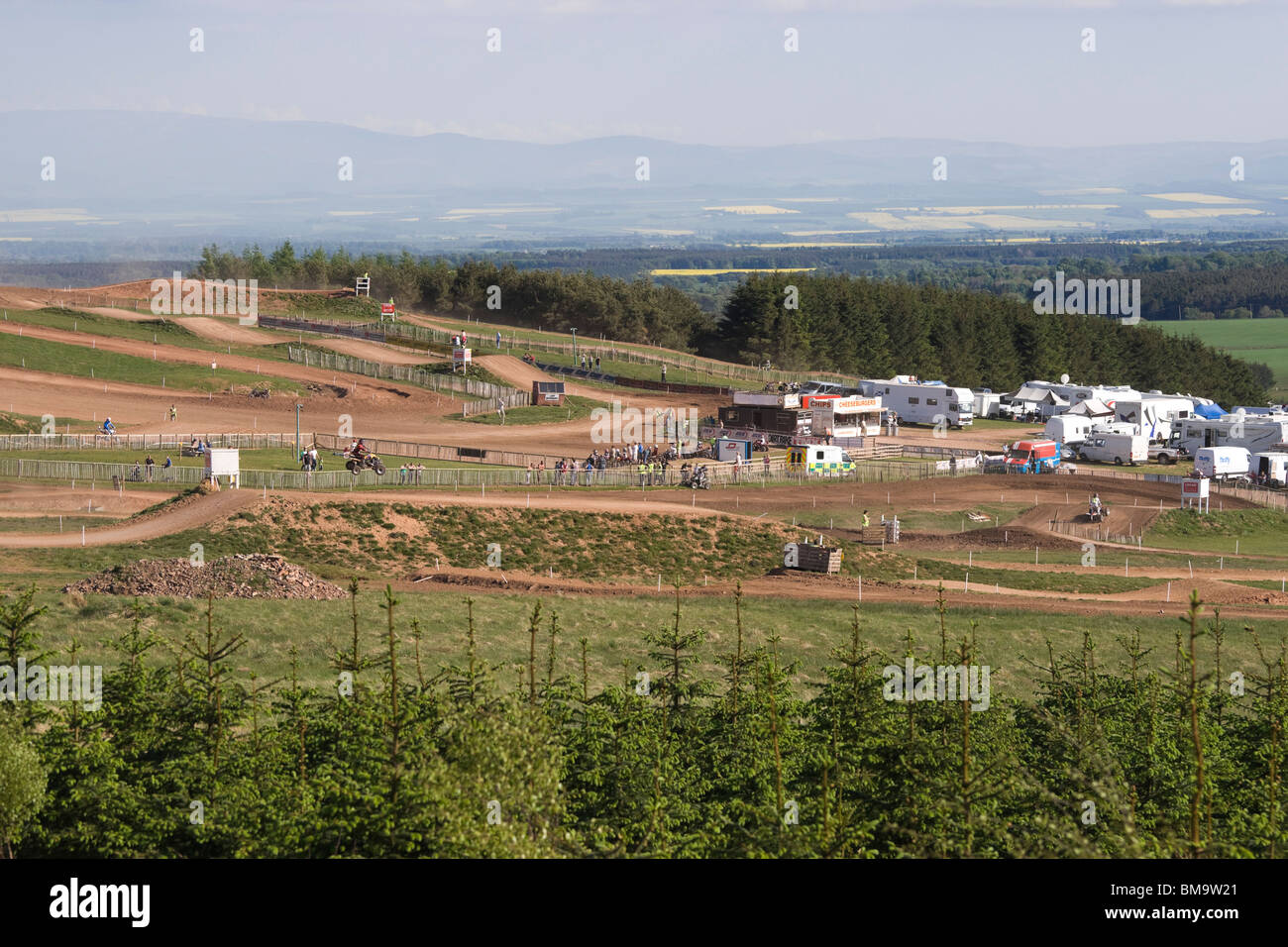 Duns moto cross quad bike racing track in Berwickshire Scotland with Border country landscape beyond Stock Photo