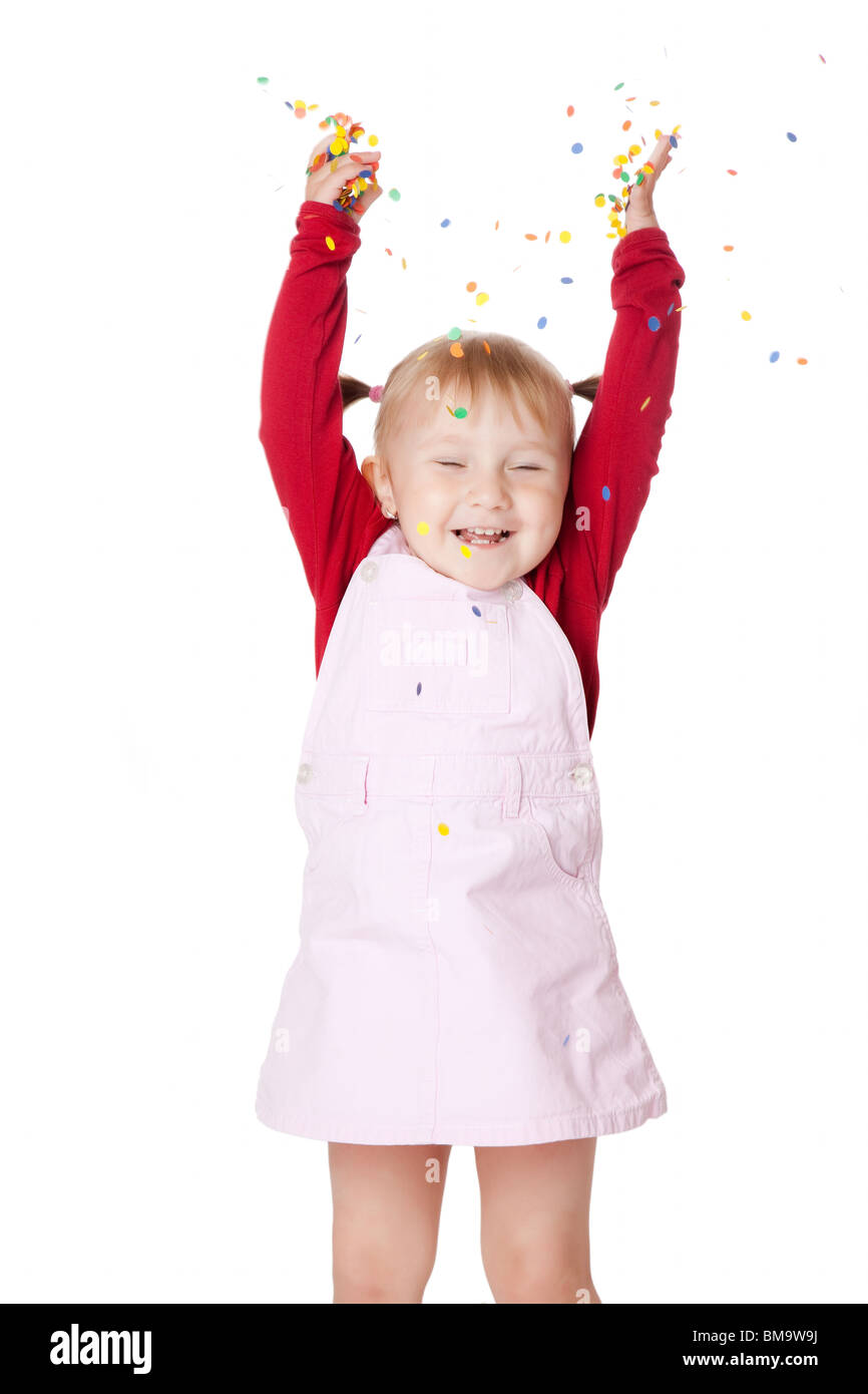 the happy little girl with confetti Stock Photo Alamy