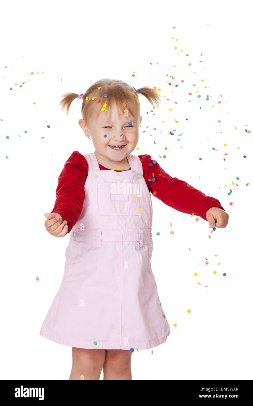 the happy little girl with confetti Stock Photo Alamy