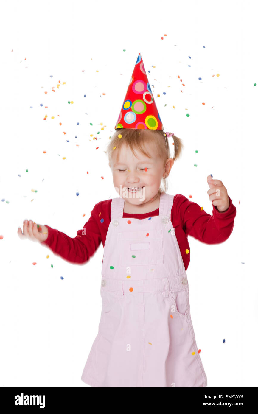 the happy little girl with confetti Stock Photo Alamy