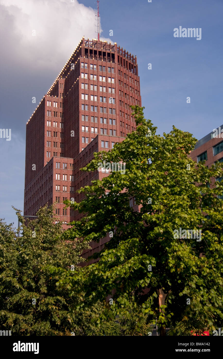Kollhoff Tower at Potsdamer Platz, Germany, rising above the trees Stock Photo