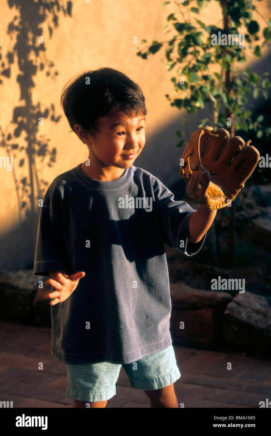 Young asian boy with baseball glove Stock Photo Alamy