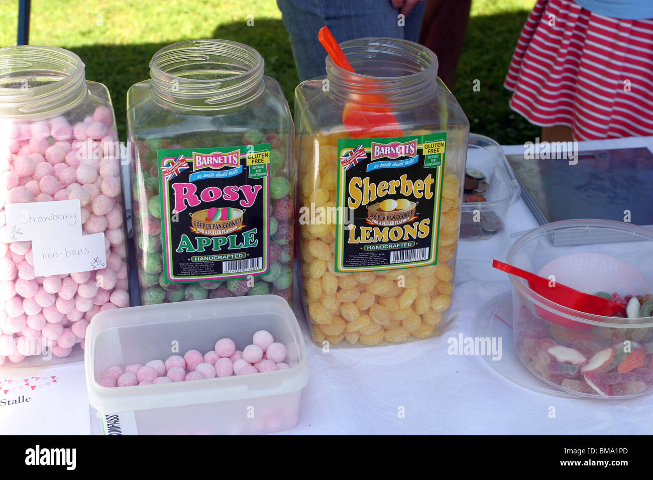 Jars of traditional English Sweets at a Summer School Fete Stock Photo