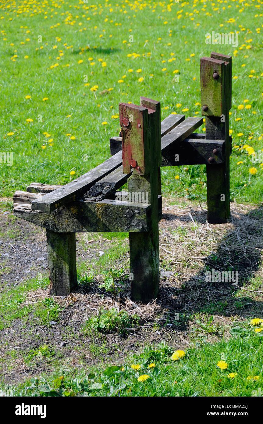 delapidated park bench Stock Photo