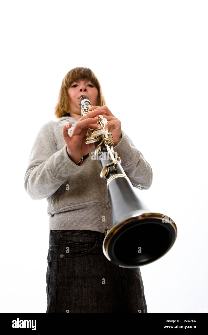 Young girl playing clarinet Stock Photo