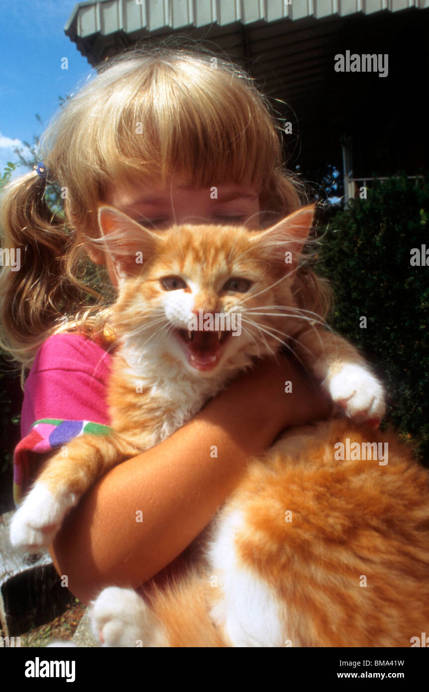 Girl with her pet cat. Stock Photo