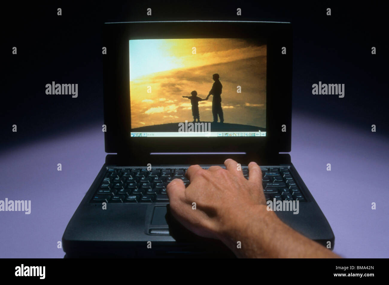 Laptop computer with digital image Stock Photo - Alamy