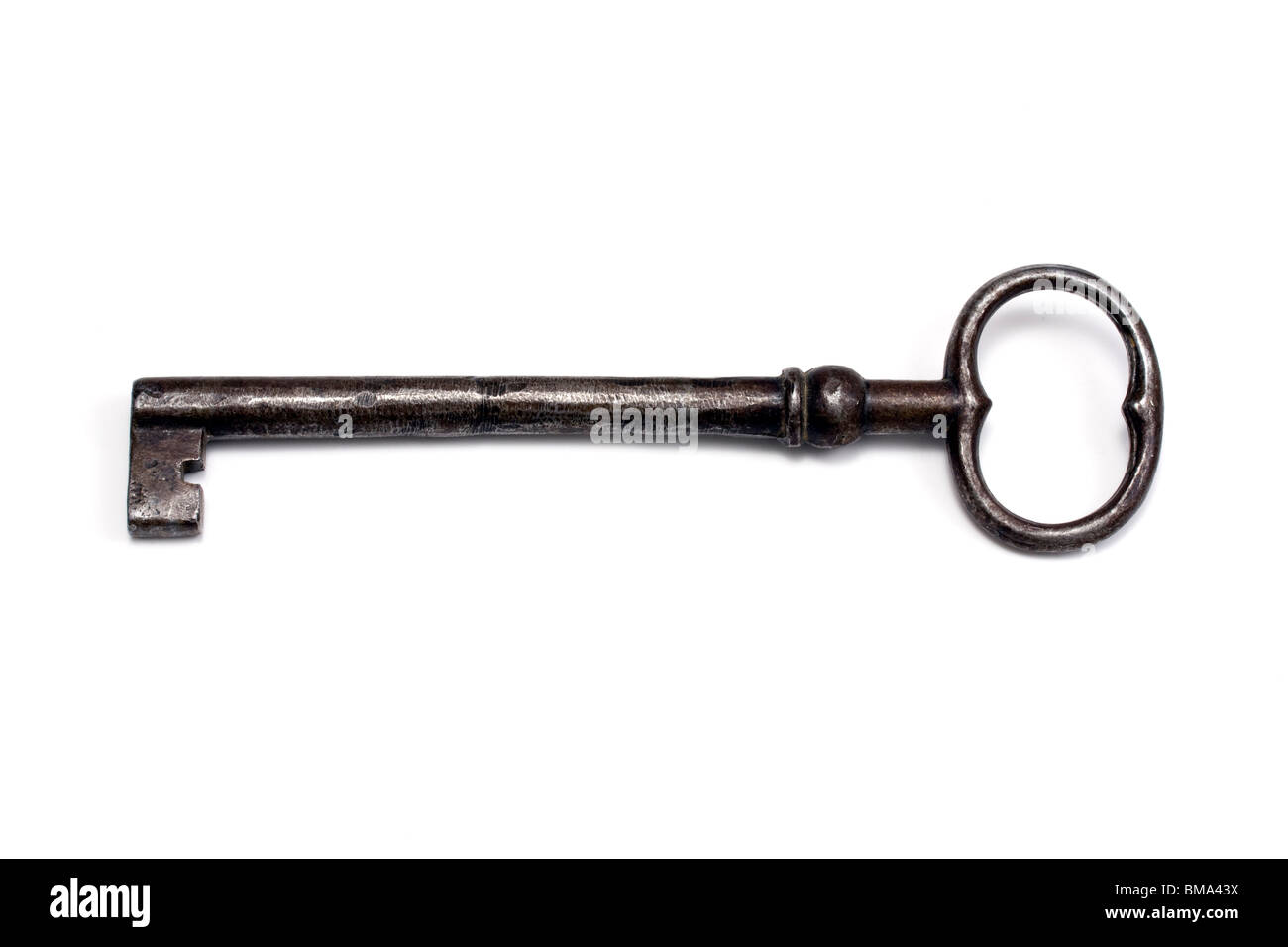 Old key isolated on white background Stock Photo - Alamy