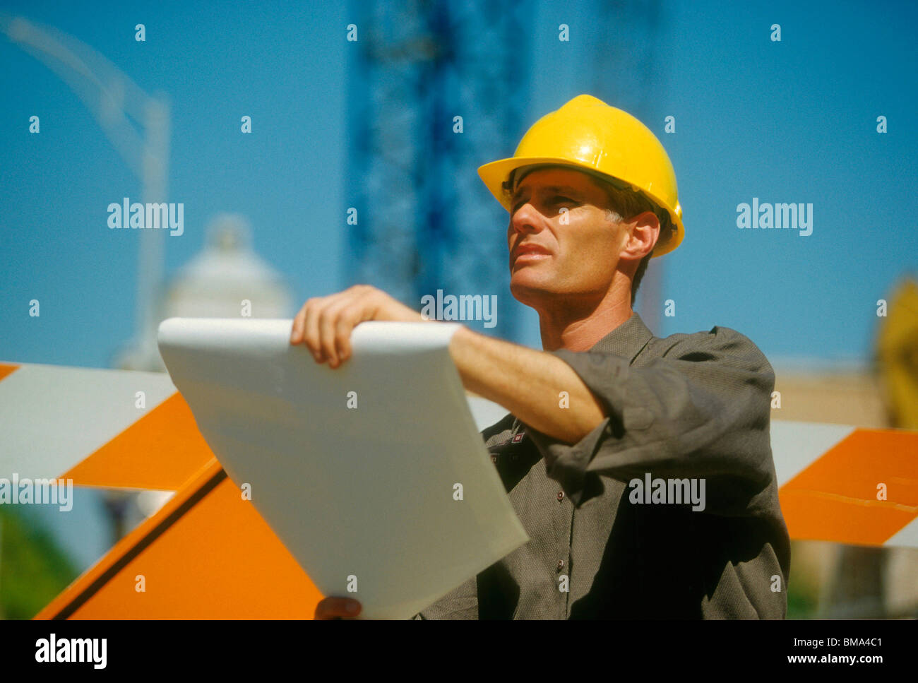 Architect on construction site Stock Photo - Alamy