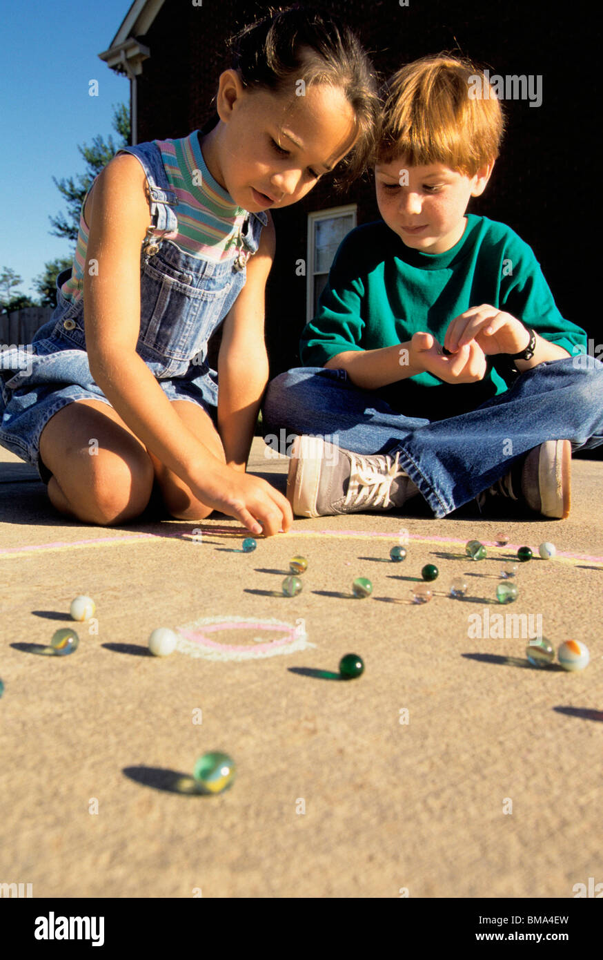 2,100+ Kids Playing Marbles Stock Photos, Pictures & Royalty-Free