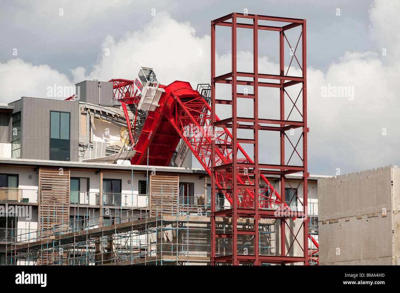 Tower crane fallen over on building Stock Photo