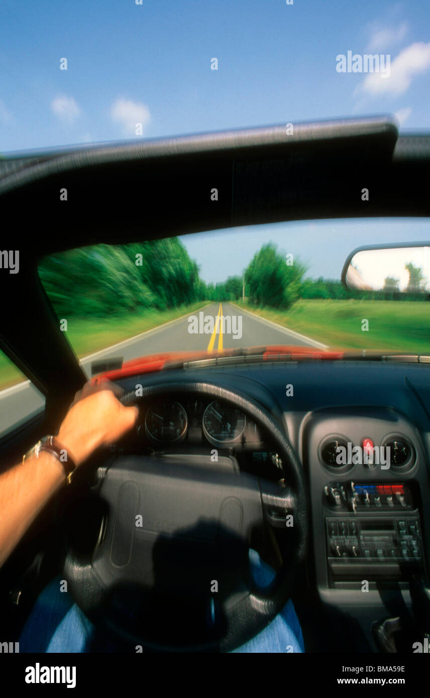 Driving a sports car Stock Photo Alamy