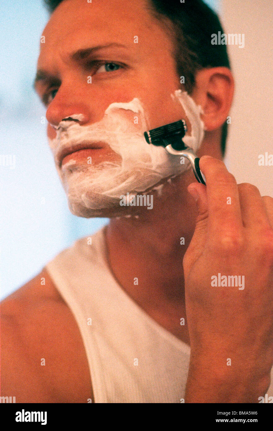 Man shaving. Stock Photo