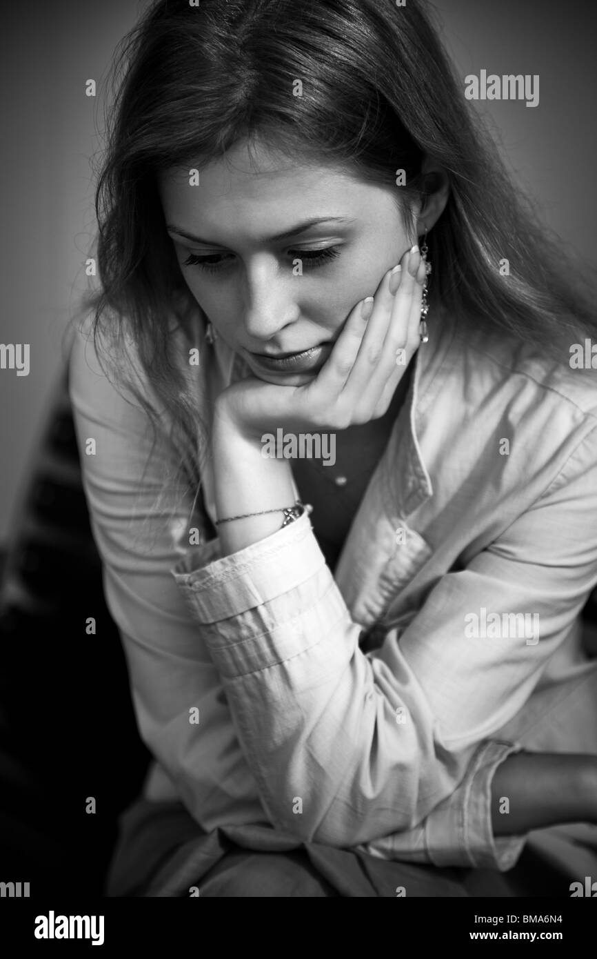 Sad girl looking down Black and White Stock Photos & Images Alamy