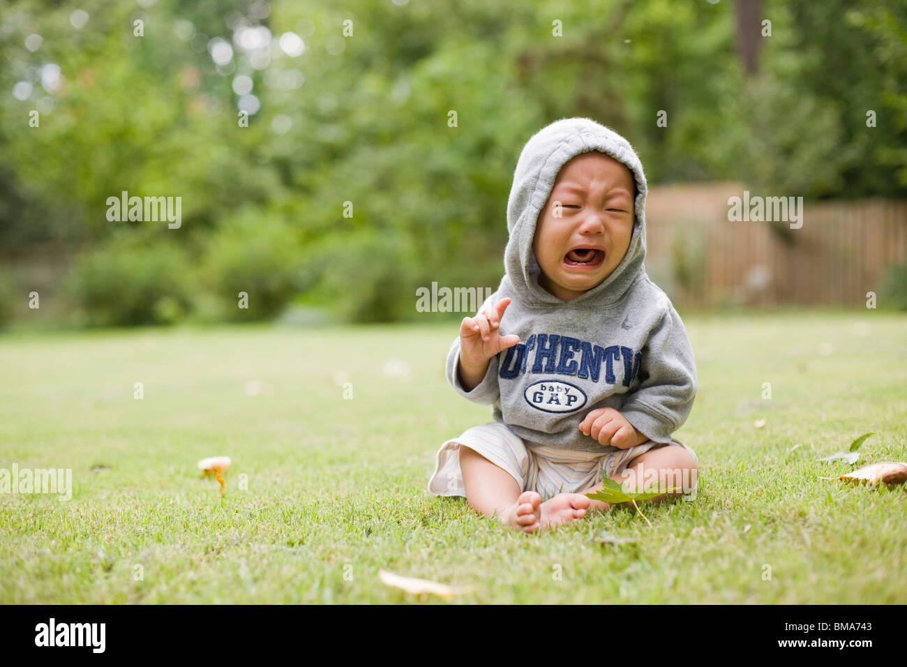 Crying Asian baby boy Stock Photo