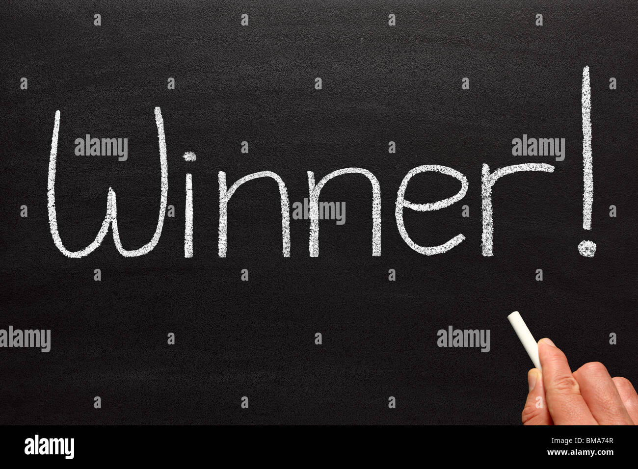 Winner, written on a blackboard. Stock Photo