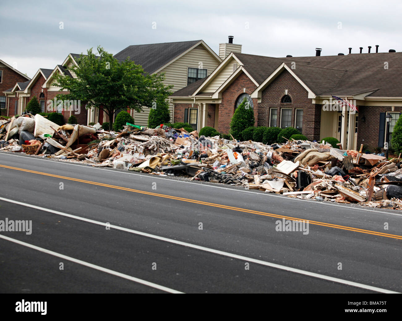 Houses sit in ruin on Sawyer Brown Road located in the Nashville suburb of Bellevue on Friday