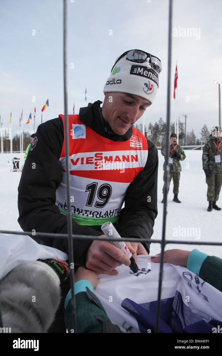Olympic Champion Vincent Jay France signs autographs IBU World Cup Biathlon Kontiolahti Finland March 13 2010 Photo: ROB WATKINS Stock Photo