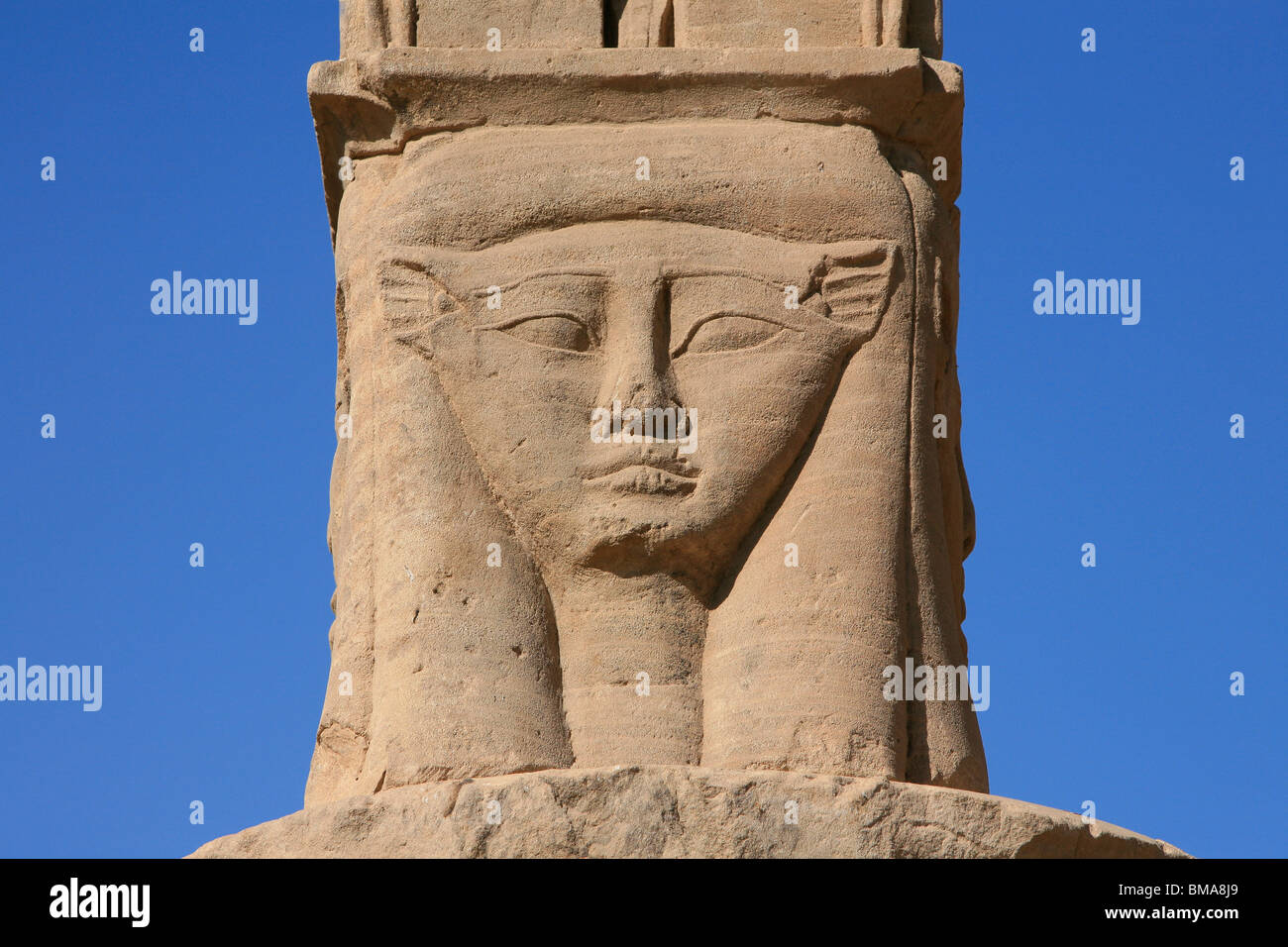 Chapiter with the head of the goddess Hathor at the Temple of Philae on Agilka Island in Upper Egypt Stock Photo