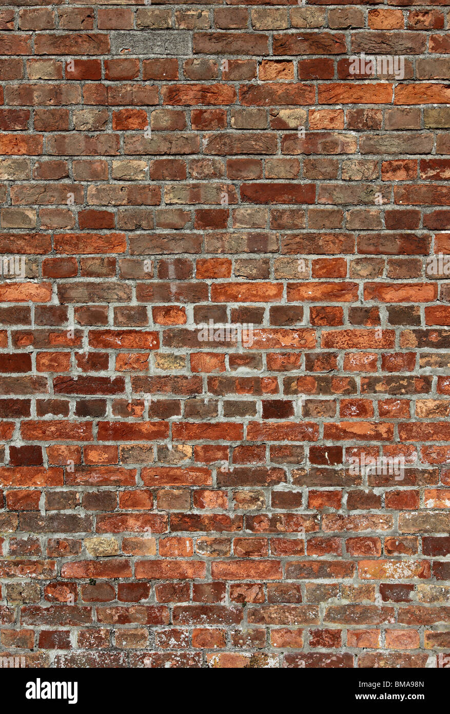 Dirty old red brick wall close up Stock Photo - Alamy