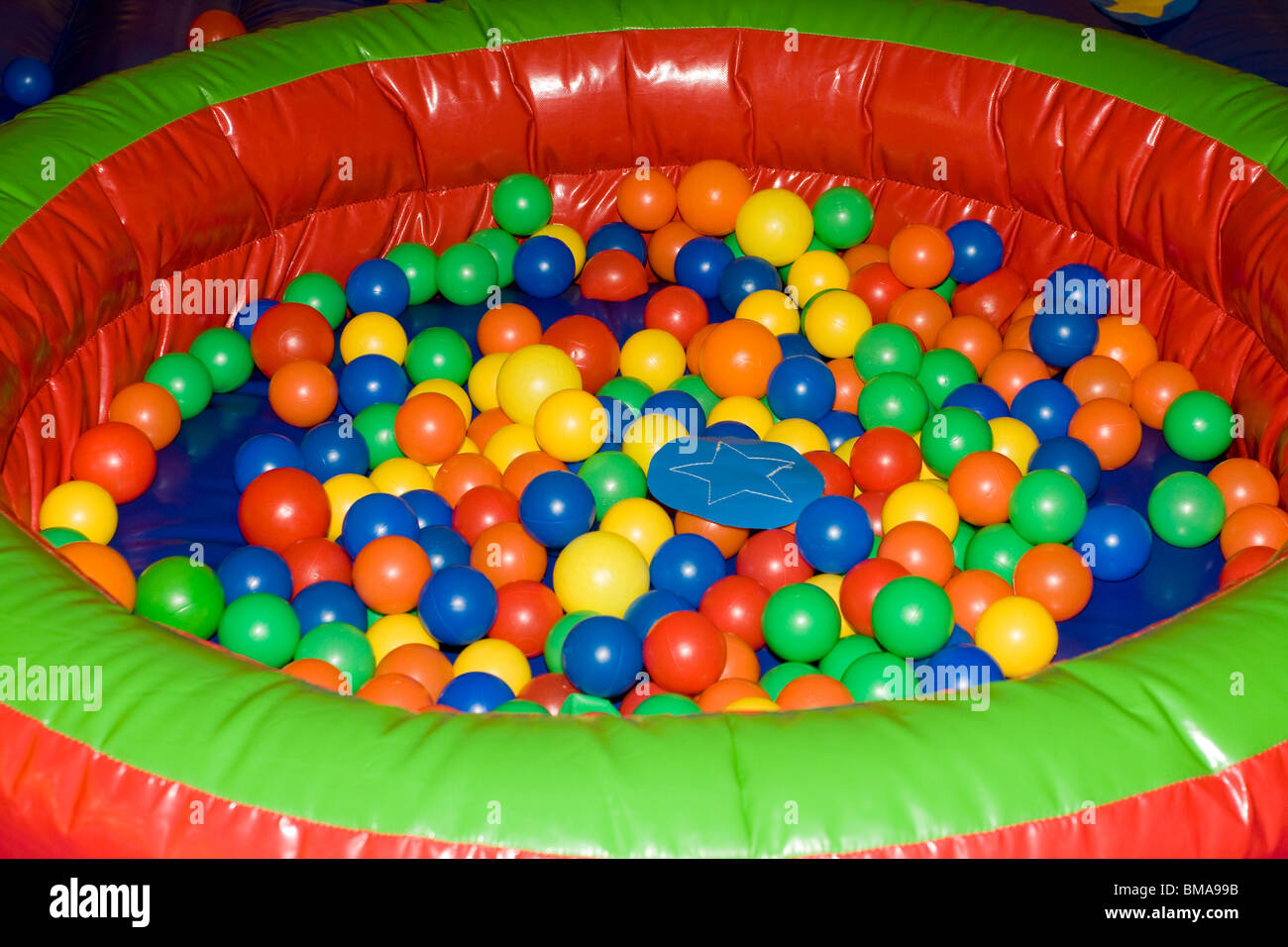 Colored plastic balls in play area Stock Photo Alamy