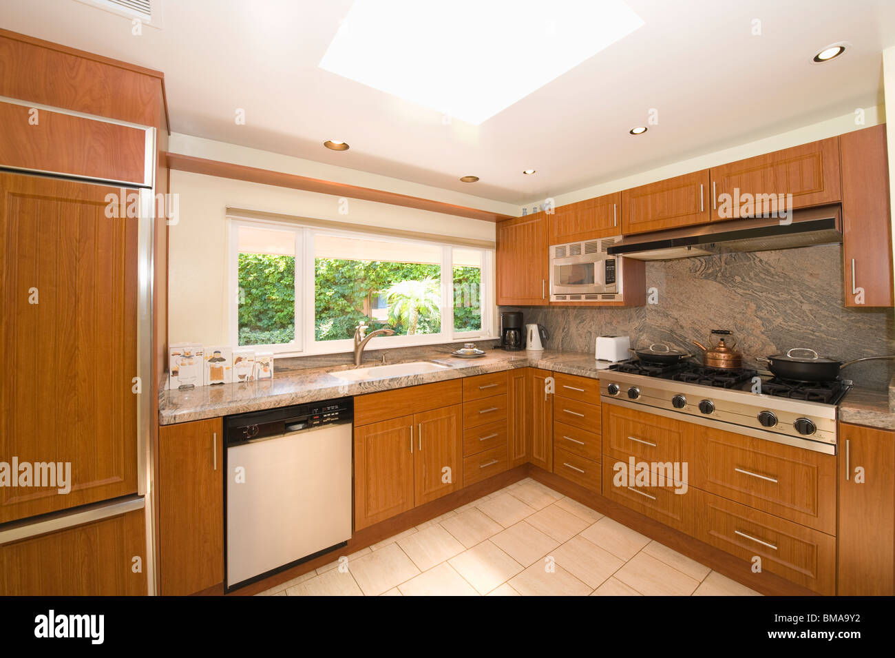 Wooden fitted kitchen units Stock Photo