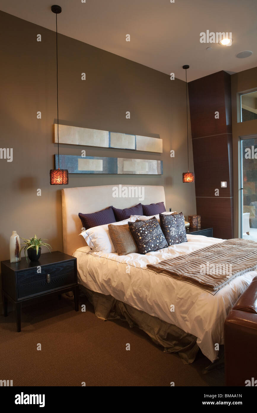 Pendant lights in bedroom with silk furnishings Stock Photo Alamy