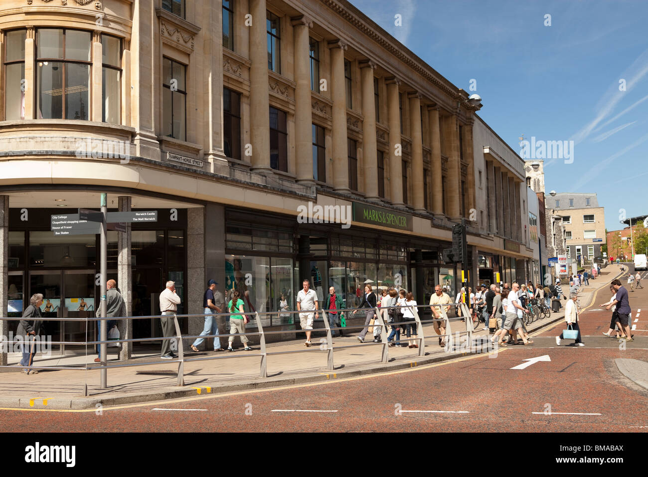 Marks and Spencers on Norwich city centre high street, busy Saturday morning with lots of shoppers Stock Photo