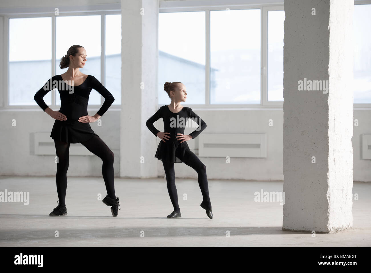 Female dancers with hands on hips Stock Photo Alamy