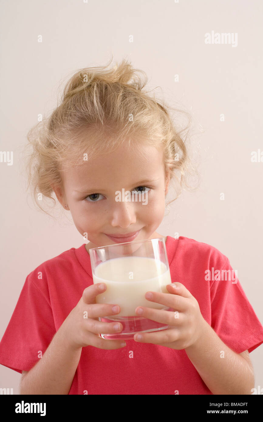 Girl Drinking Milk Stock Photo Alamy