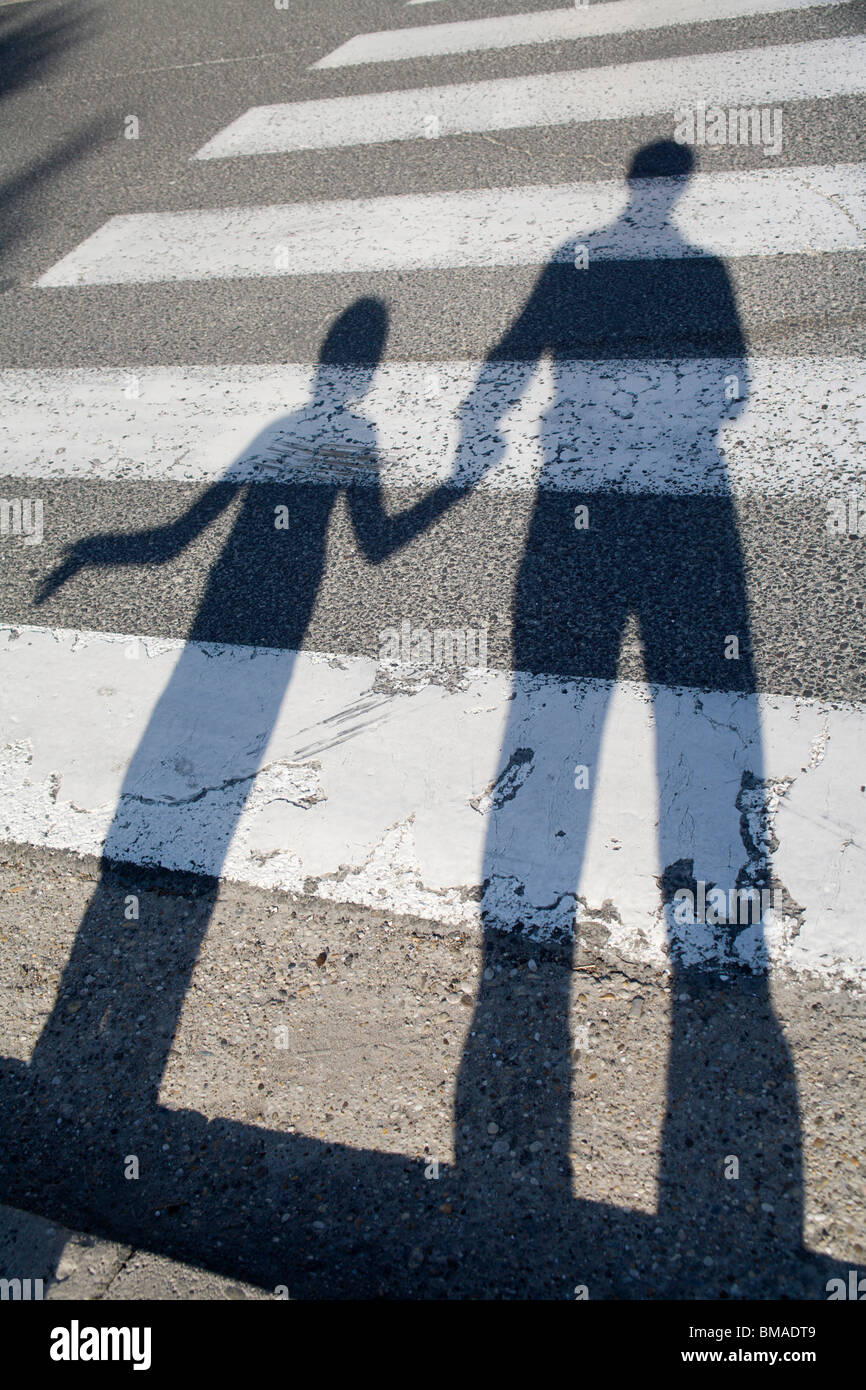 shadow of man and child on the way Stock Photo Alamy