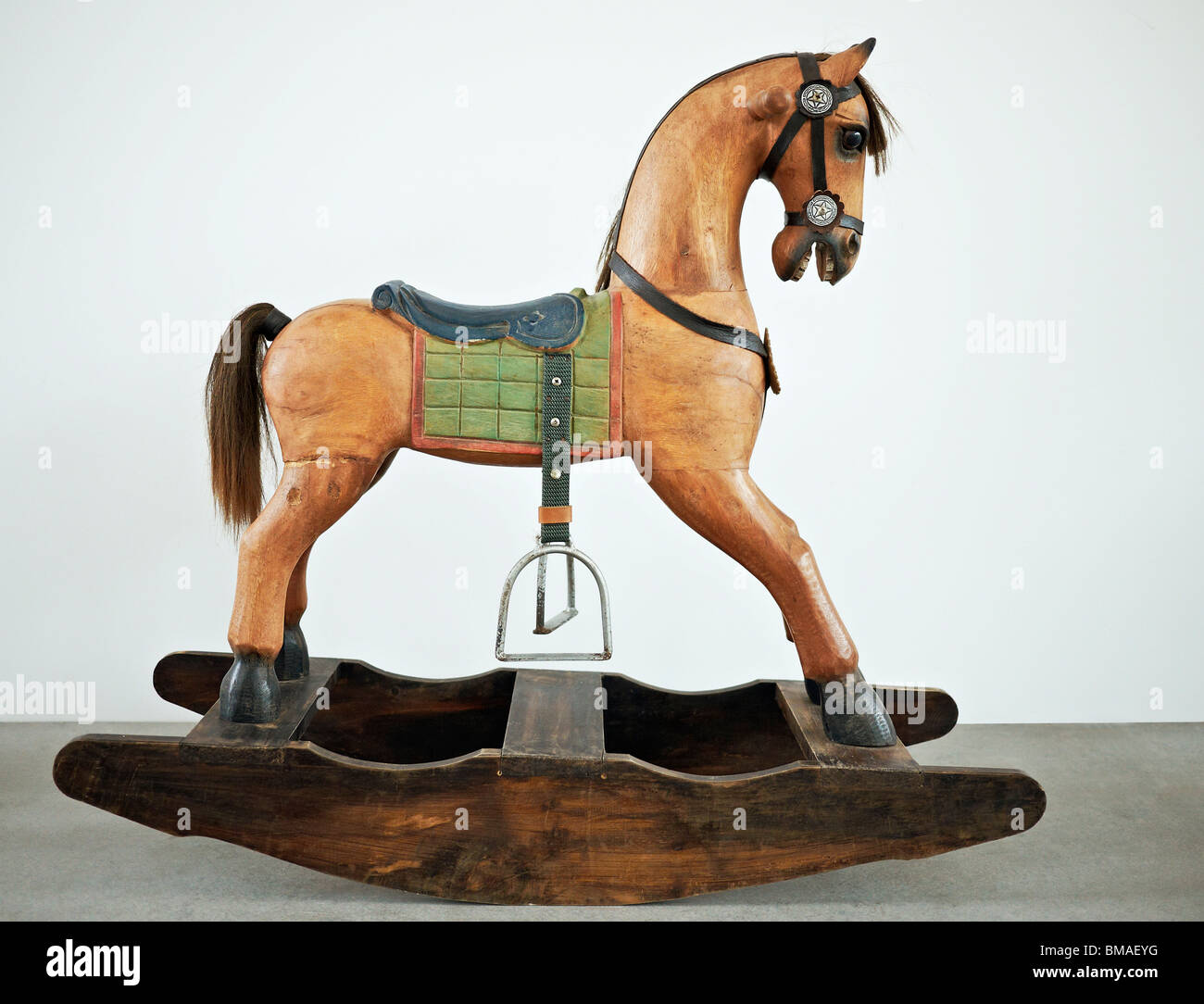 Rocking horse. Old wooden antique rocking horse Stock Photo