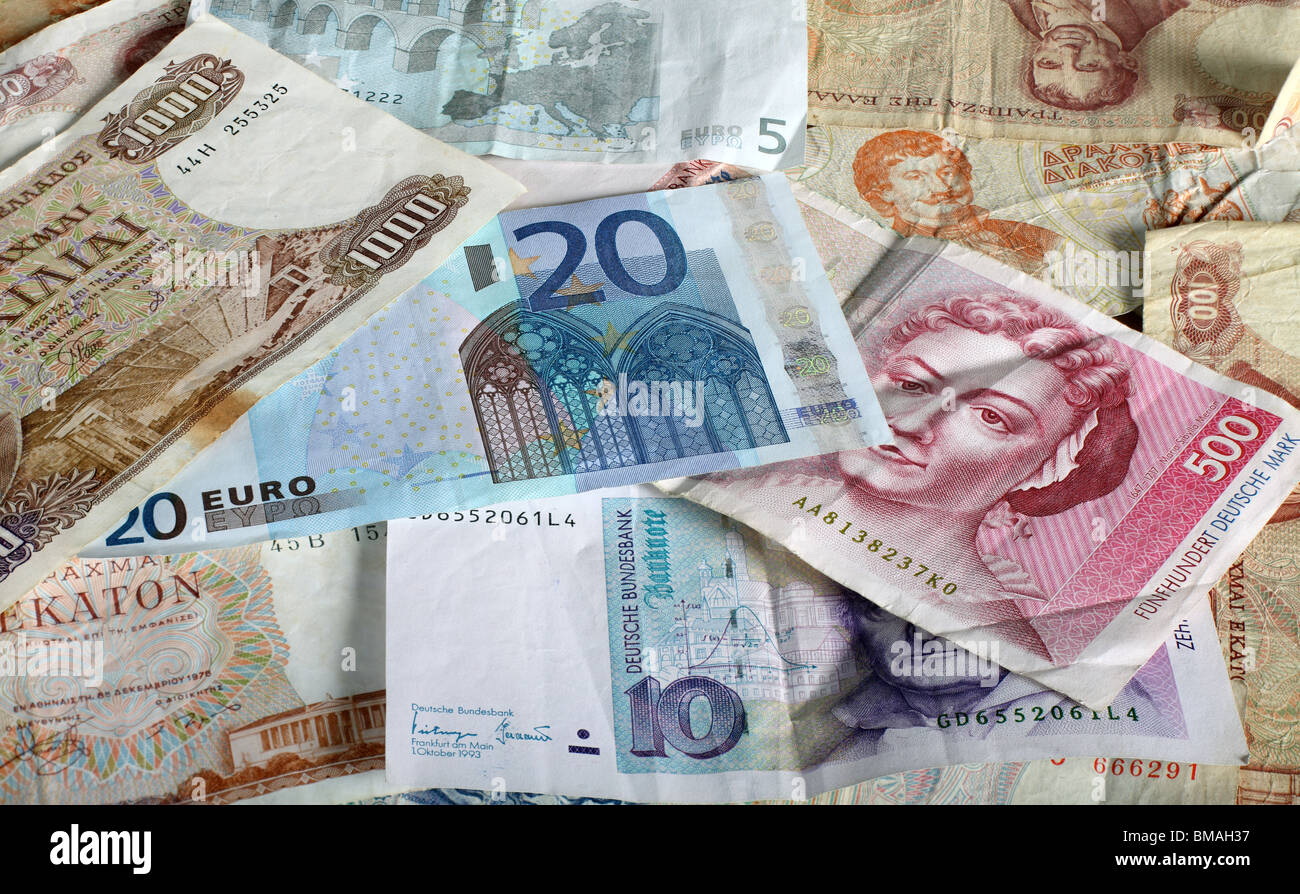 Euro currency notes with demonetised Greek drachma and German Deutschmarks. Stock Photo