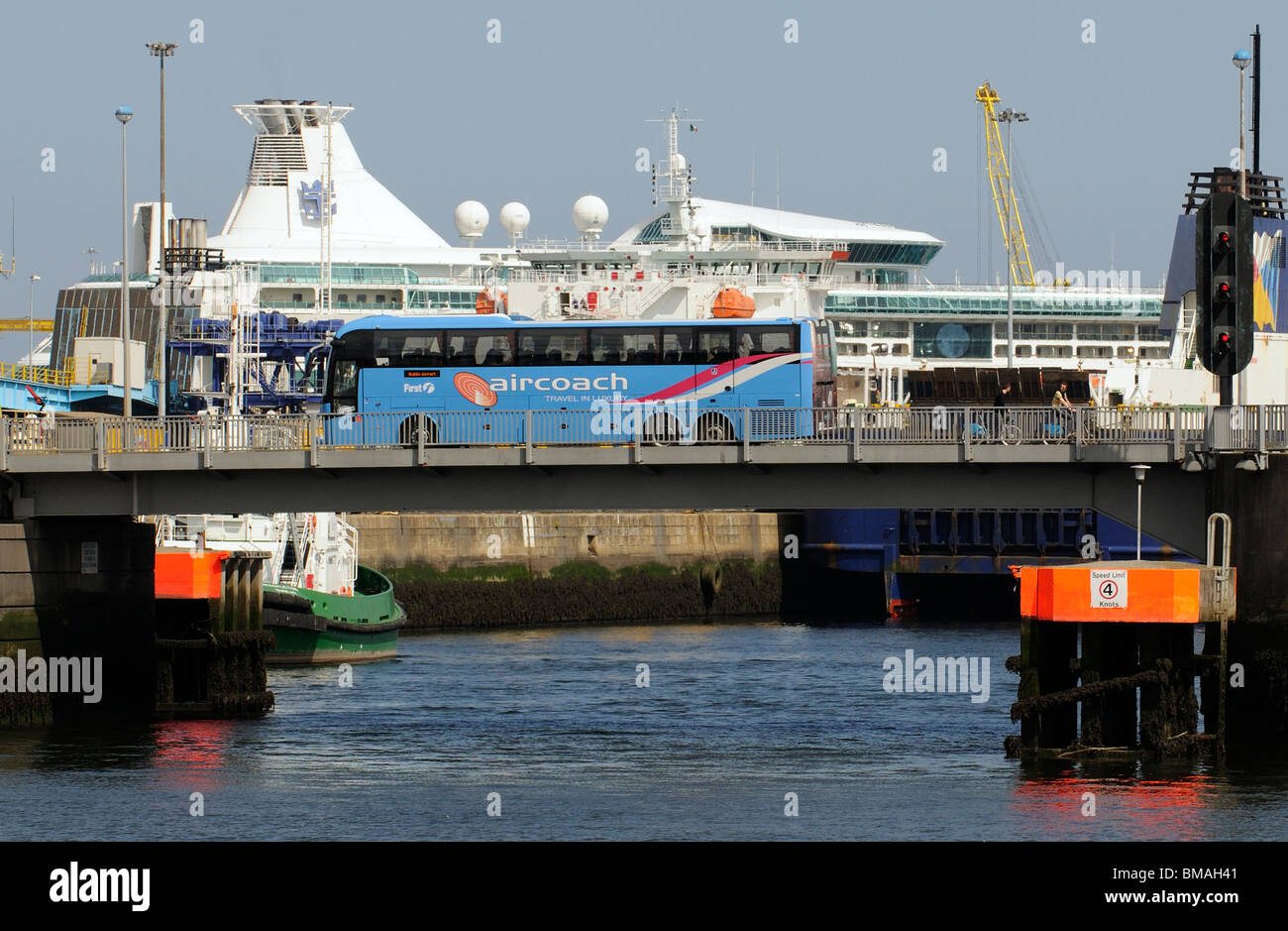 Dublin Port Ireland an Aircoach company vehicle crossing the East Link Bridge transporting cruise passengers into the city Stock Photo