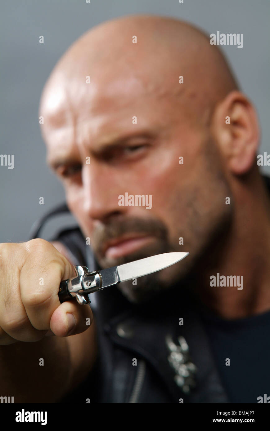 A man with a knife Stock Photo