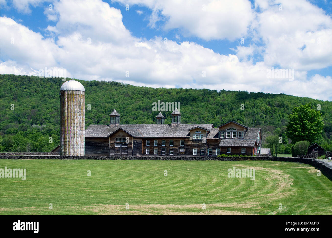 A vintage horse barn with silo Stock Photo - Alamy