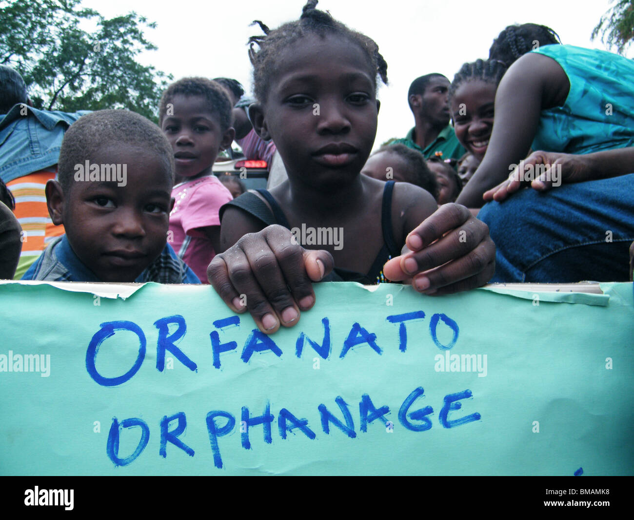 Orphans wait for aid in Port au Prince after the January earthquake in Haiti Stock Photo