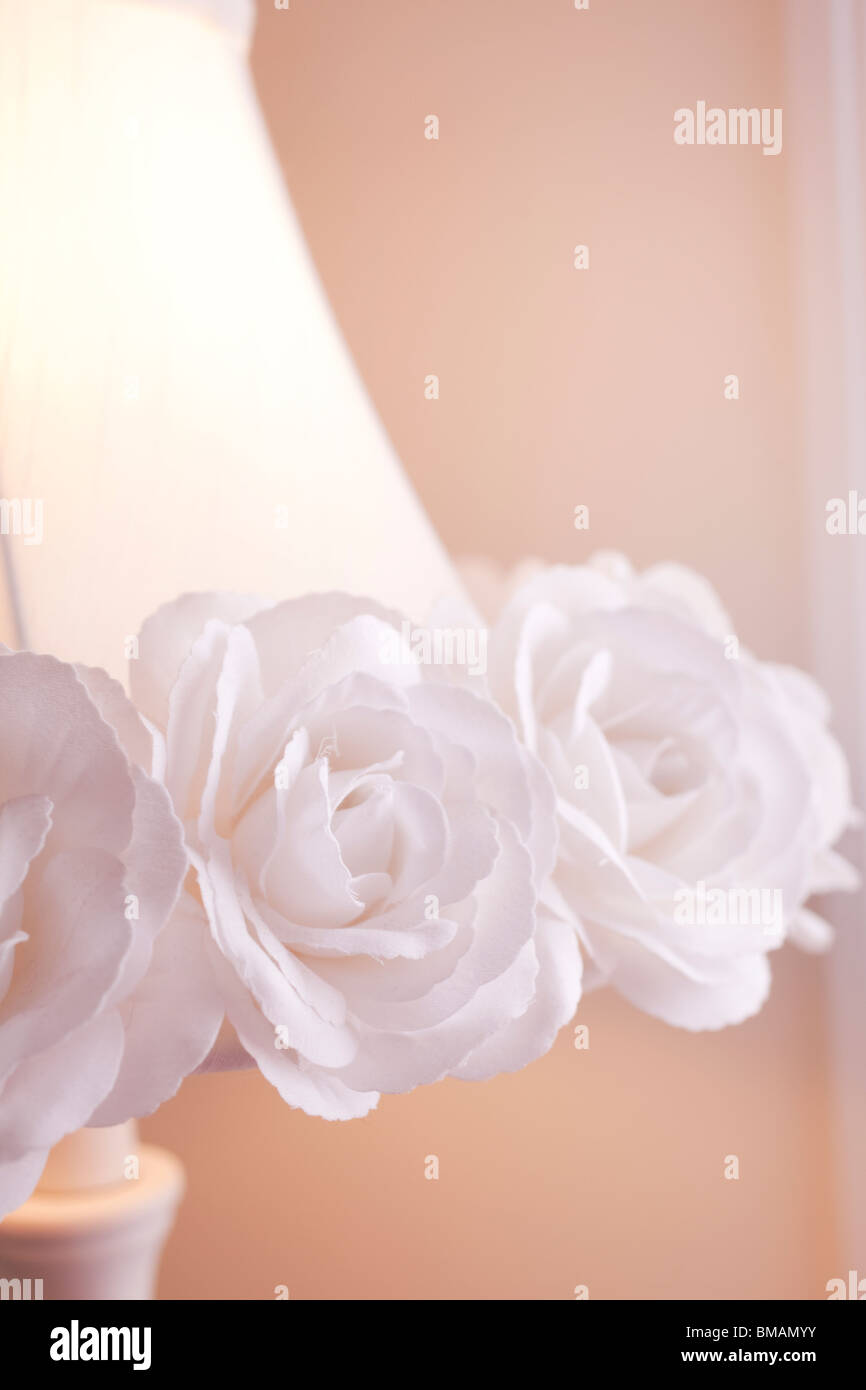 Bedside lamp detail with decorative roses on the shade Stock Photo Alamy
