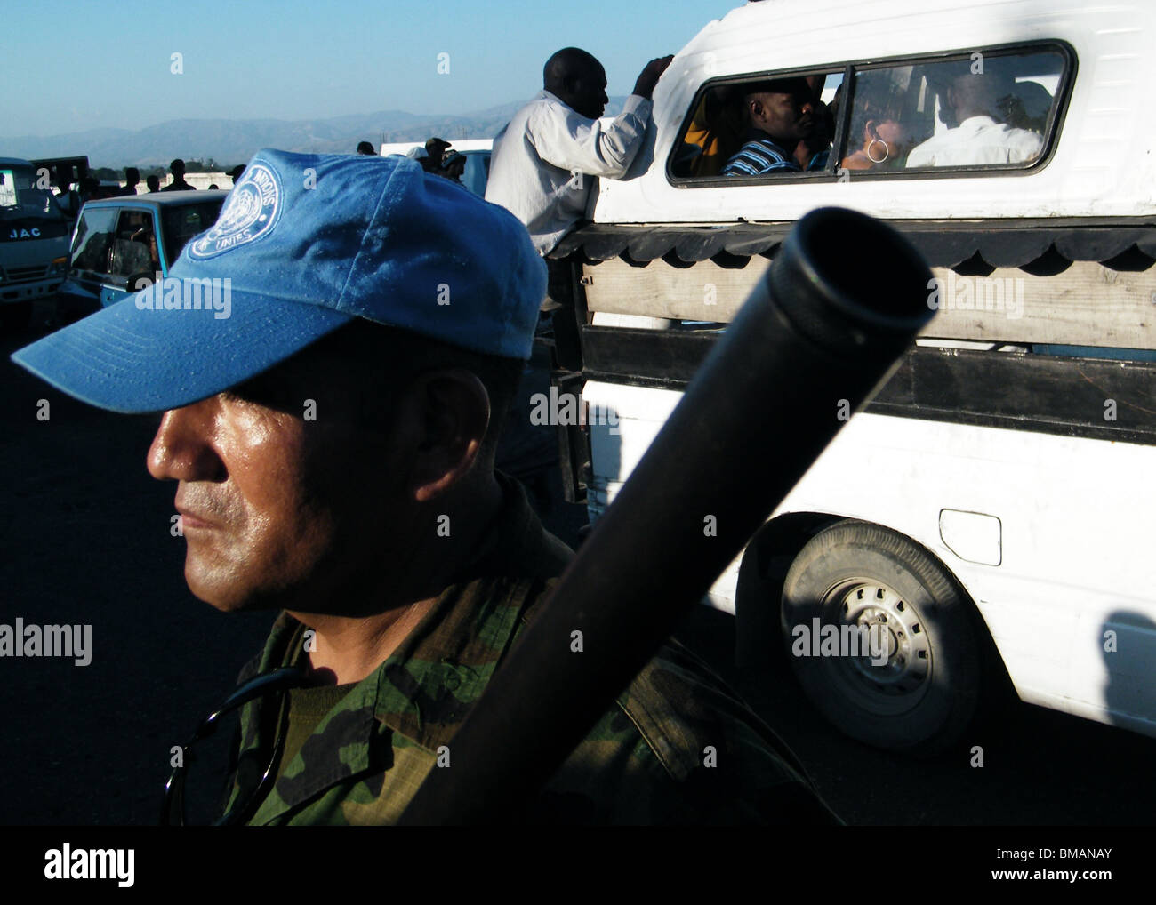 A United Nations (MINUSTAH) soldier stands guard outside an aid centre