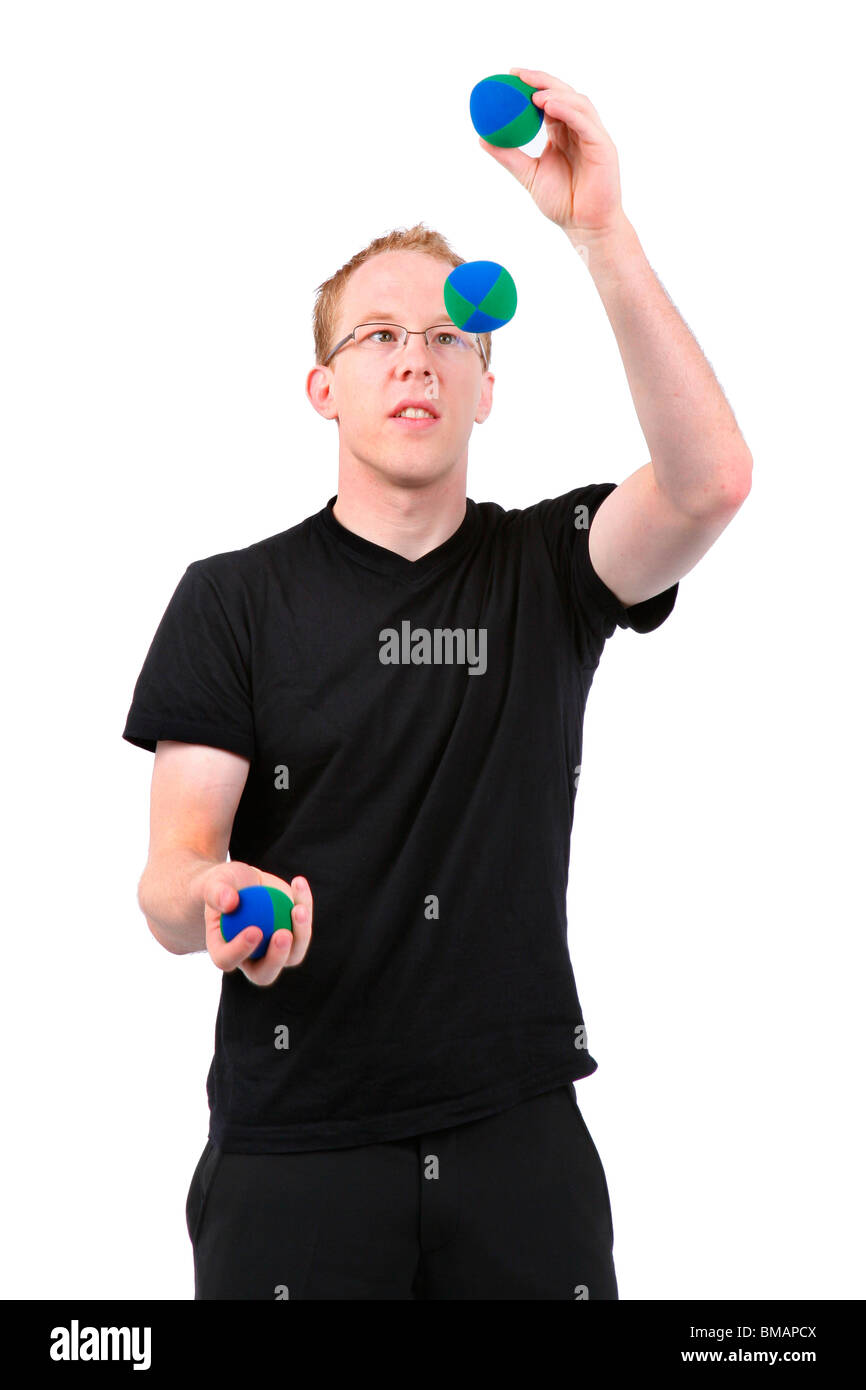 young man juggling with balls Stock Photo Alamy