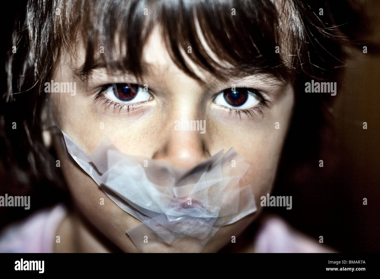young boy gagged with tape Stock Photo Alamy