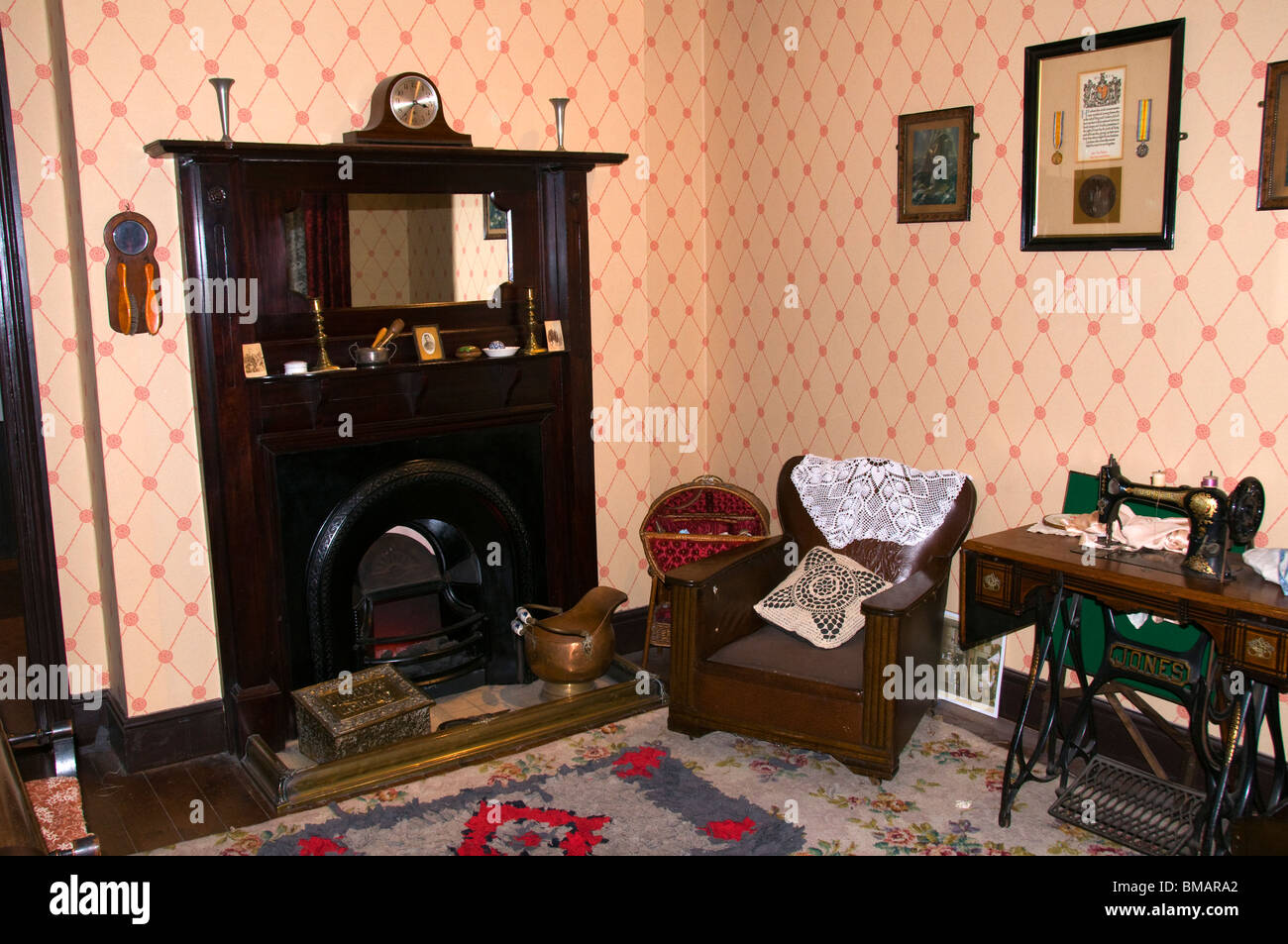 Representation of the living room of an early 20th century working class home, Portland Basin Museum, Ashton under Lyne Stock Photo