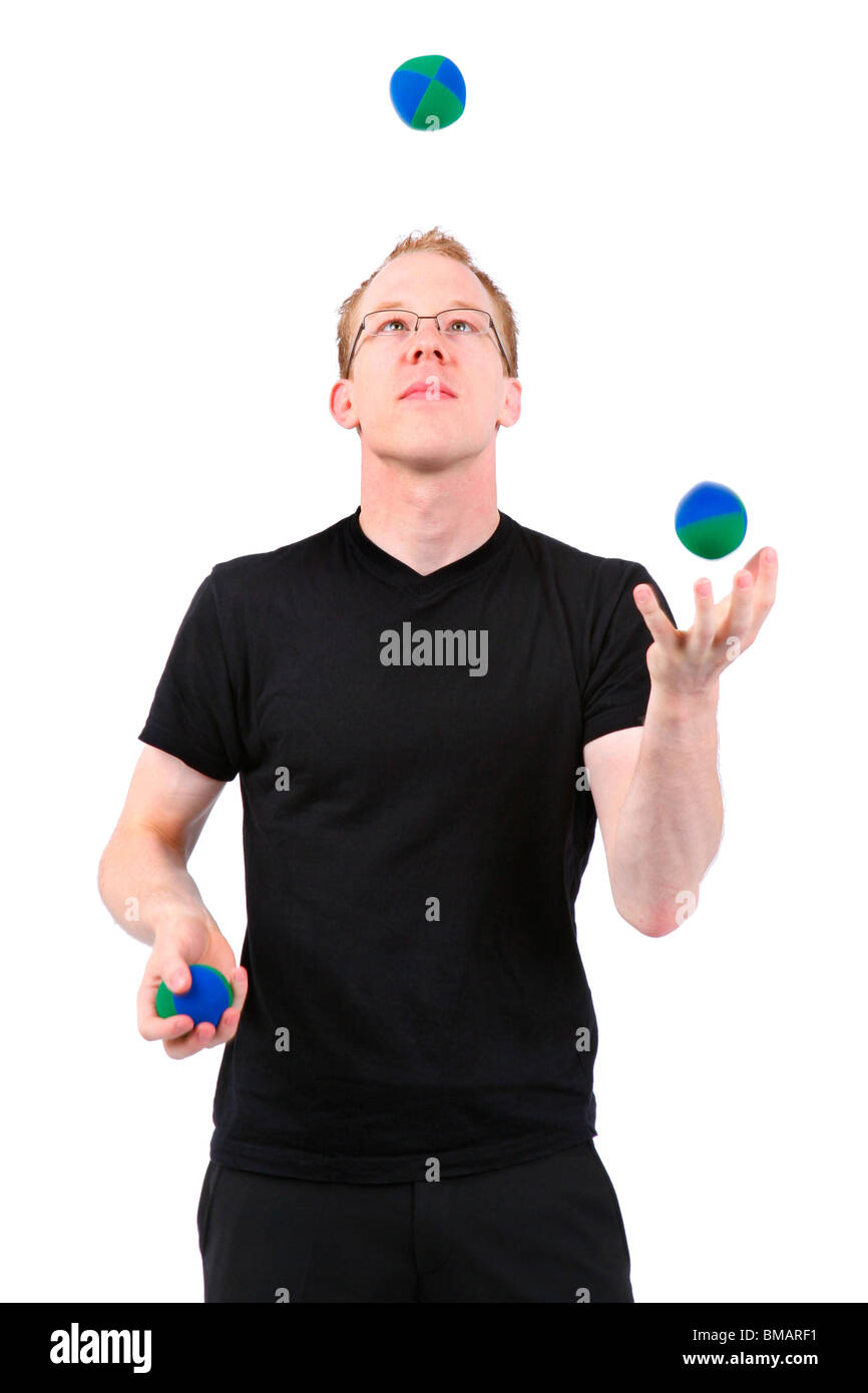 young man juggling with balls Stock Photo Alamy