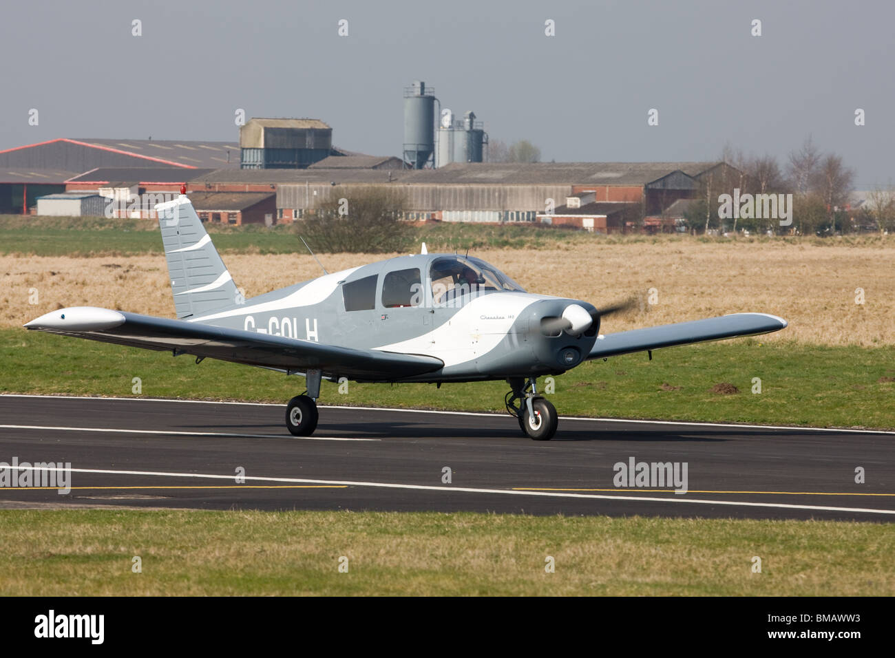 Piper Pa 28 140 Cherokee G Colh Aircraft Taxiing Along The Runway At Sandtoft Airfield Stock Photo Alamy